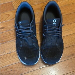 On Running Black Athletic Shoes with Cushioned Sole